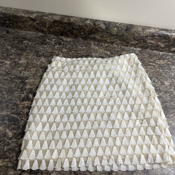 EUC Lulus mini skirt. Cream tassels,  lined, side zipper. 16.5” long. Size Small - Picture 2 of 7